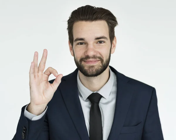 Young businessman showing ok sign — Stock Photo, Image