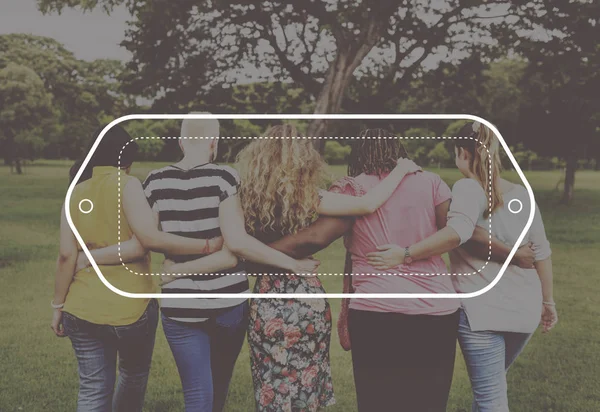 Women walking together in park — Stock Photo, Image