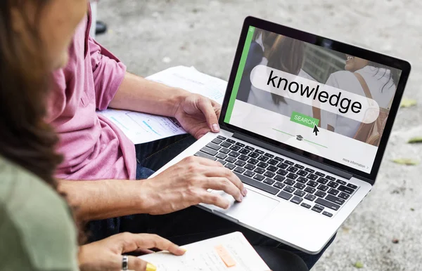 Students using laptop together — Stock Photo, Image