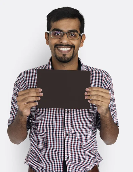 Indian man holding paper blank — Stock Photo, Image