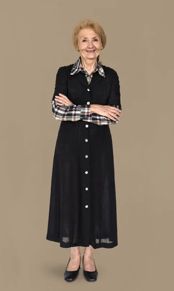 Senior vrouw in lange jurk — Stockfoto