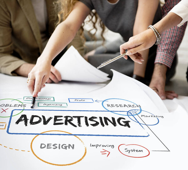 designers working with poster 