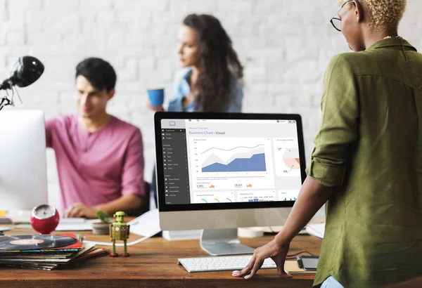 Woman working on computer in the office — Stock Photo, Image