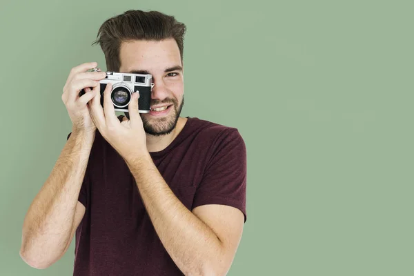 Mann fotografiert vor Kamera — Stockfoto