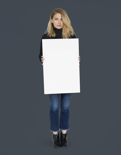 woman holding banner