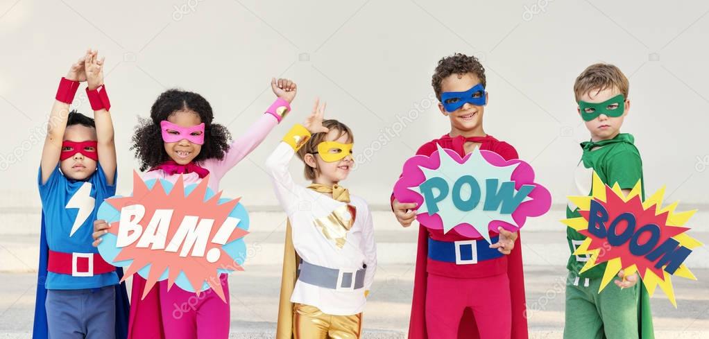 children in superhero costumes