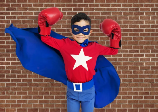 Boy wearing boxing gloves — Stock Photo, Image