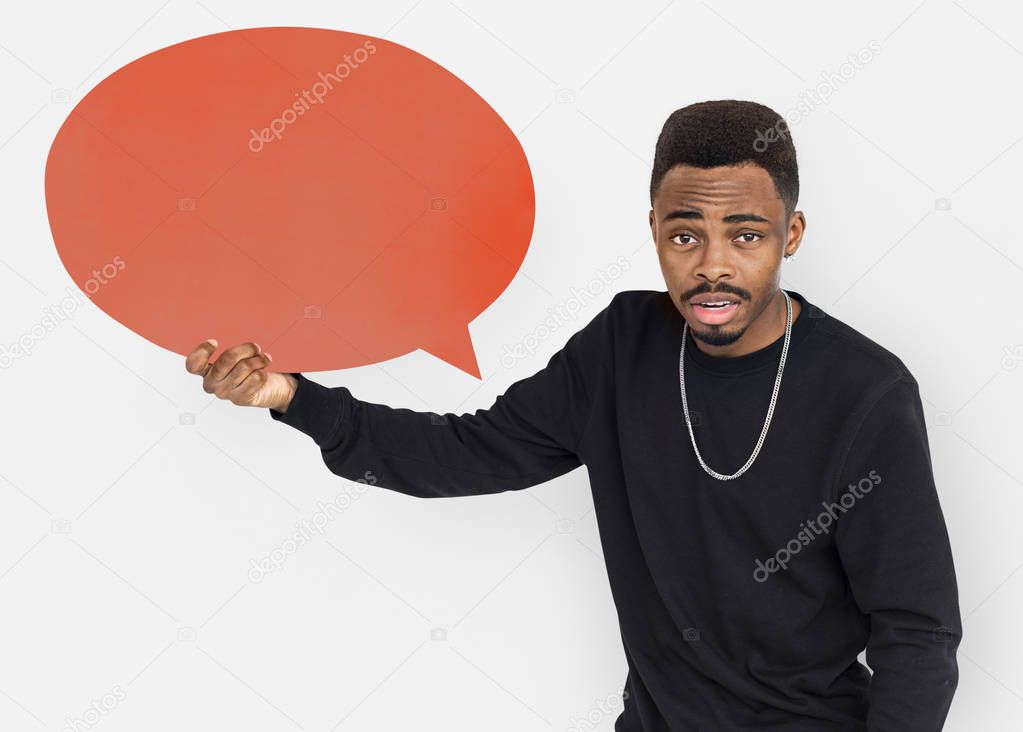 man holding speech bubble