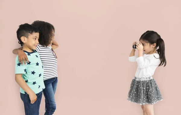 Children taking photos with camera — Stock Photo, Image