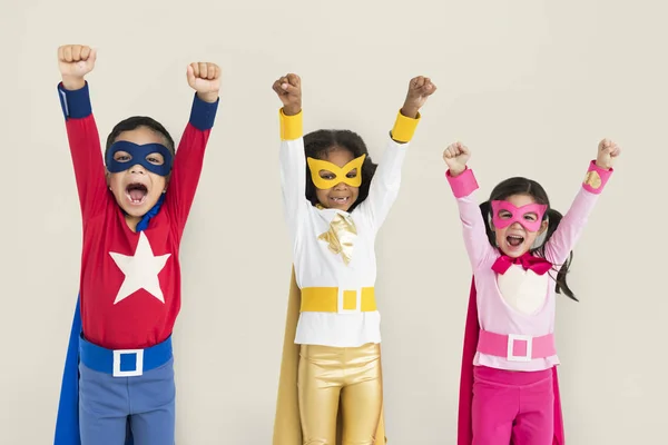 Children wearing superhero costumes — Stock Photo, Image