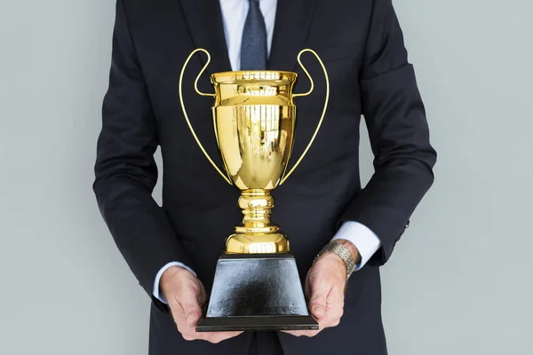 Businessman Holding Trophy — Stock Photo, Image