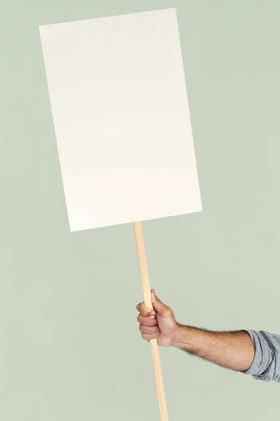 Menschliche Hand hält Banner — Stockfoto