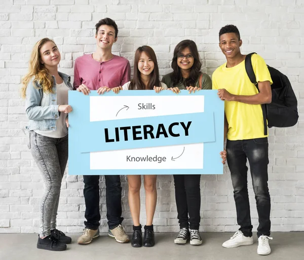 Students holding placard — Stock Photo, Image