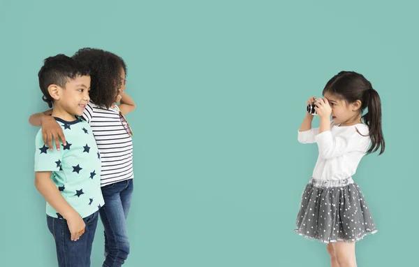 Children taking photos with camera — Stock Photo, Image