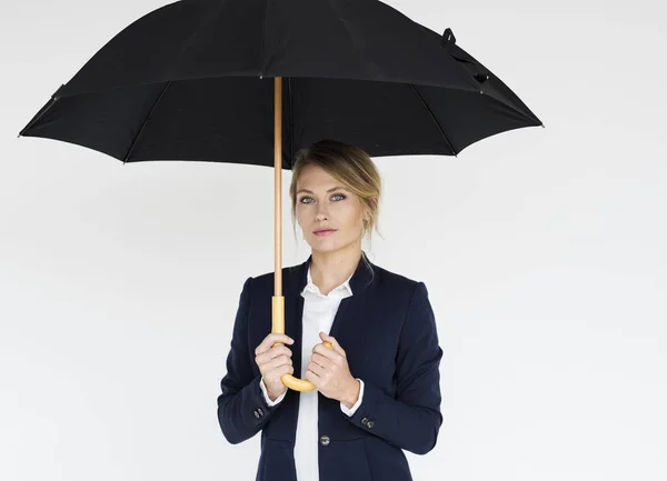 Young businesswoman with umbrella — Stock Photo, Image