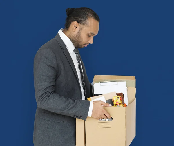 Businessman holding box — Stock Photo, Image