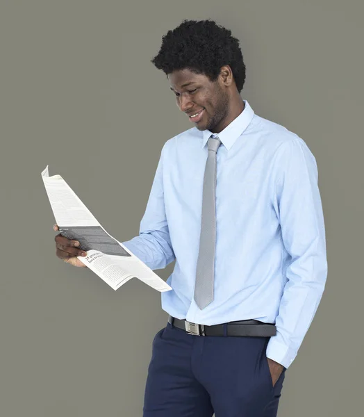 Businessman reading newspaper — Stock Photo, Image