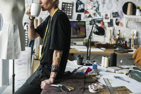 Creative designer drinking coffee