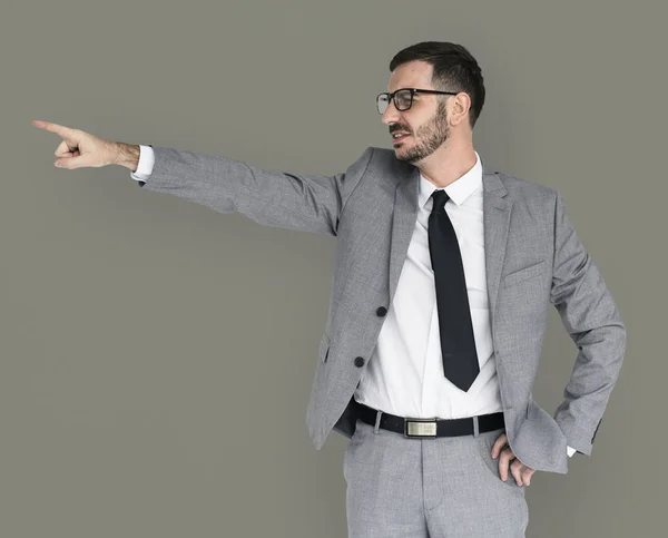 Joven Empresario señalando a un lado — Foto de Stock