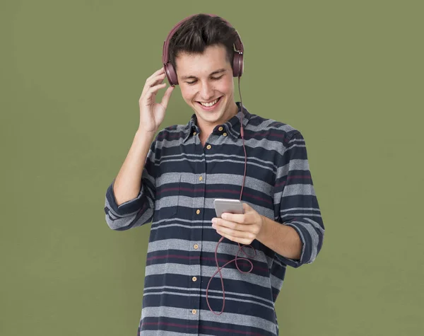 Man Listening Music in Headphones Stock Photo