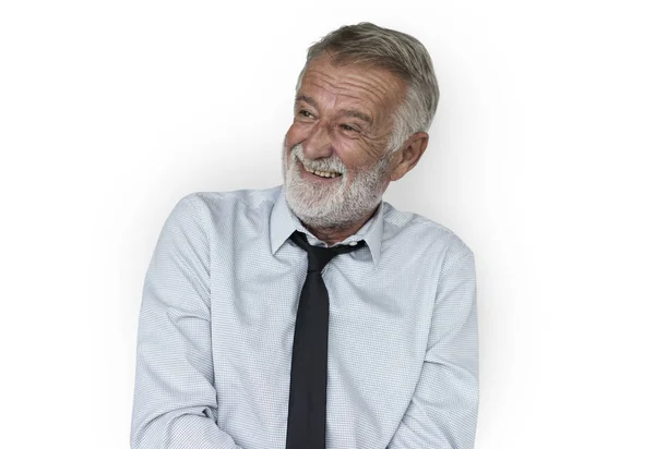 Bärtiger Senior-Geschäftsmann lächelt — Stockfoto