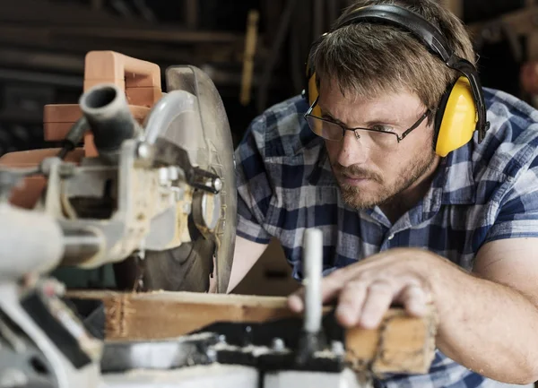 Craftman working in workshop — Stock Photo, Image