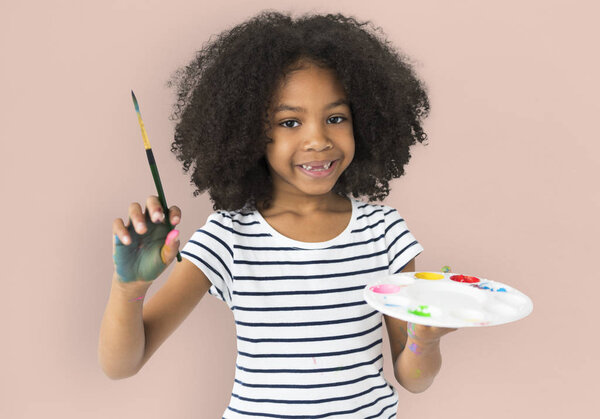 girl drawing with brush