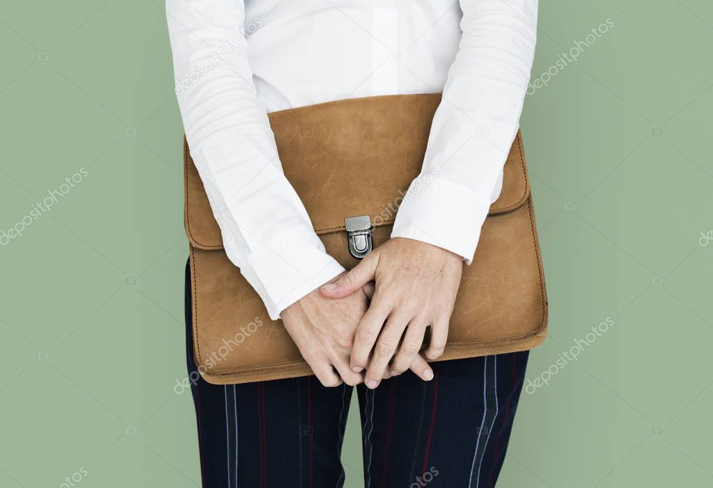 Businesswoman holding bag