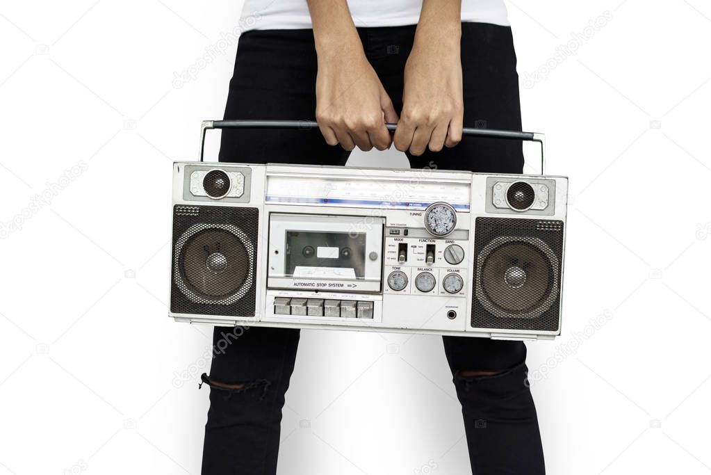 person holding old retro radio
