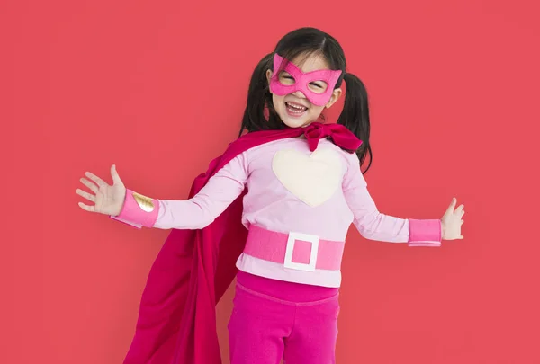 Pige i superhelt kostume - Stock-foto