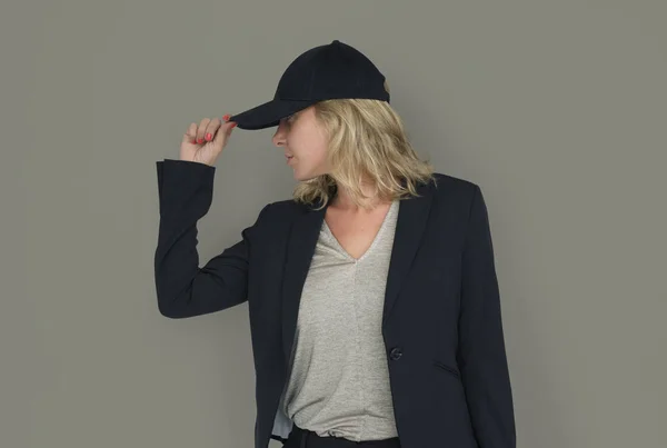 Young businesswoman in cap — Stock Photo, Image