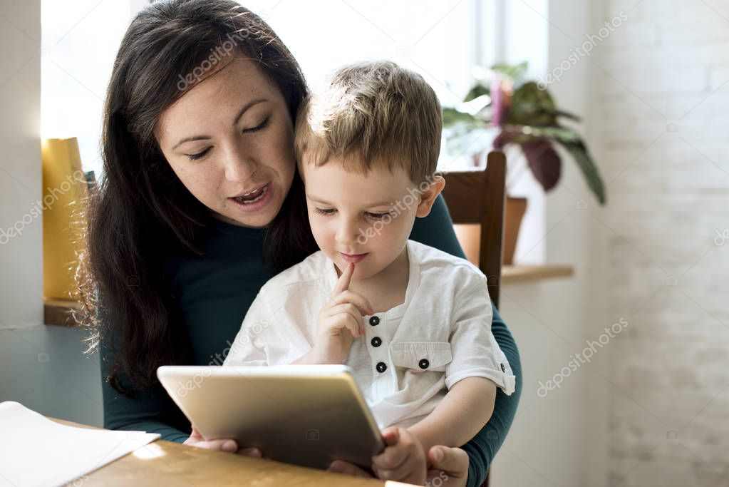Mom and Son using digital tablet 