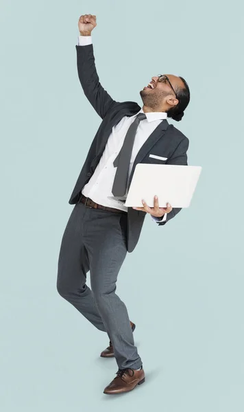 Homme d'affaires heureux avec ordinateur portable — Photo