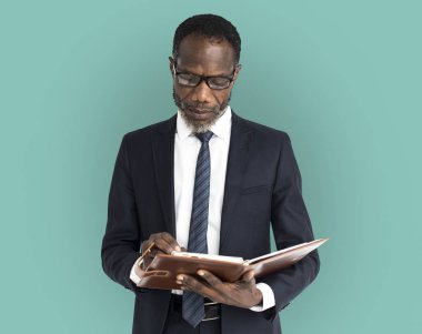 Defterde yazan iş adamı