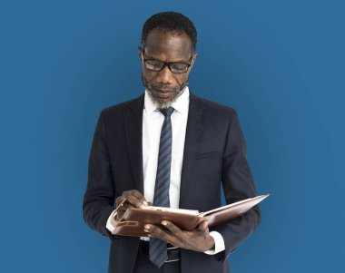 Defterde yazan iş adamı