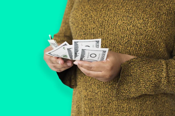 Mulher segurando notas de dinheiro — Fotografia de Stock