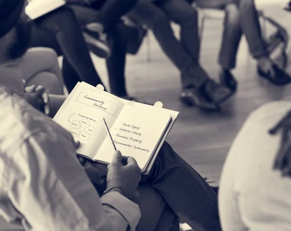 Man holding diary — Stock Photo, Image