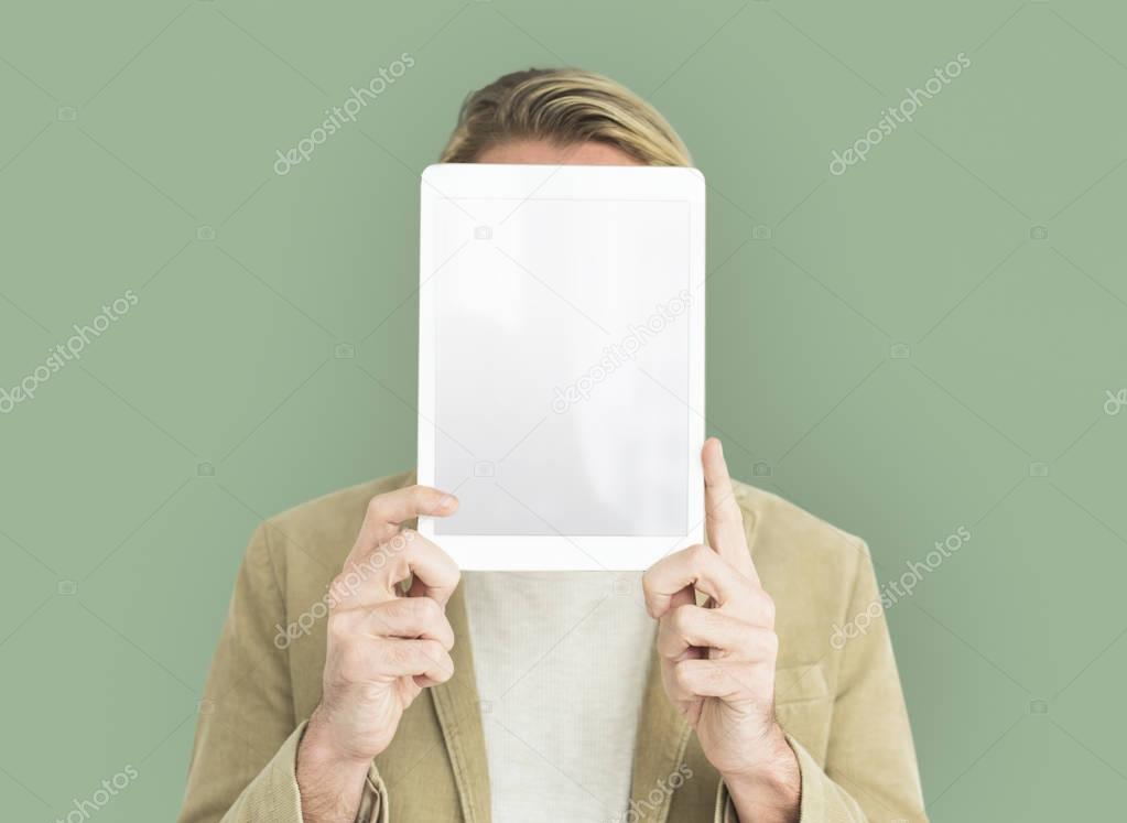 person holding digital tablet