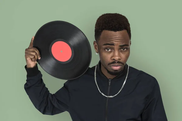 Homem africano com disco de vinil — Fotografia de Stock