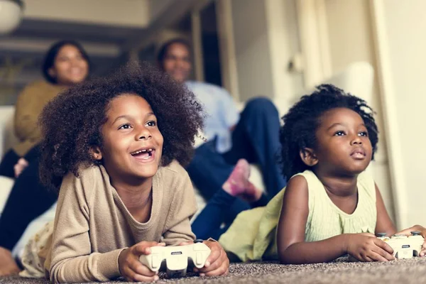 sisters playing video game