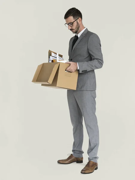 Ділова людина з коробкою — стокове фото