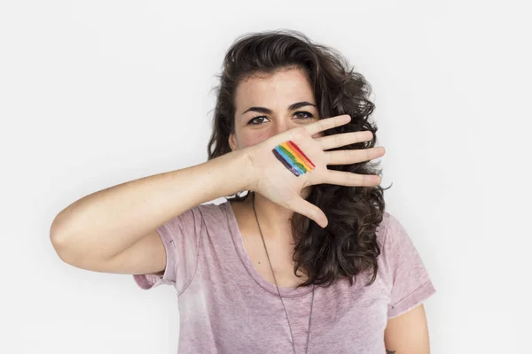 Frau mit lgtb-Fahne an der Hand — Stockfoto