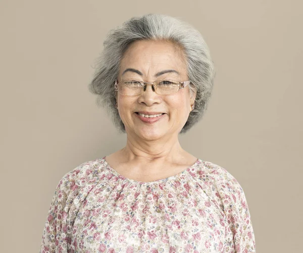 Senior asian woman in the studio — Stock Photo, Image
