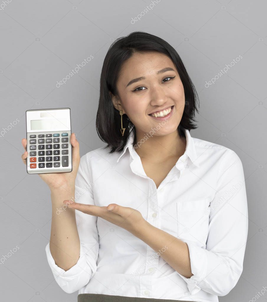 asian woman holding calculator