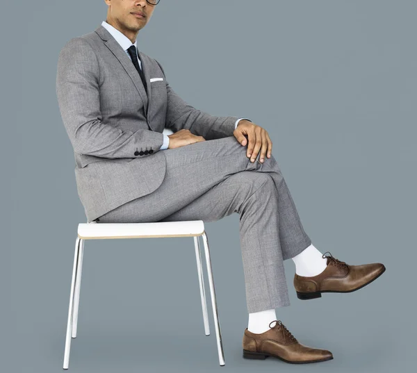 Zakenman zitten op de stoel — Stockfoto