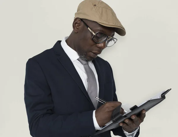 african businessman in hat