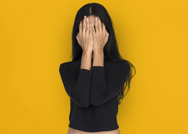 Woman covering face with hands — Stock Photo, Image