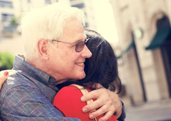 Senior couple hugging each other — Stock Photo, Image
