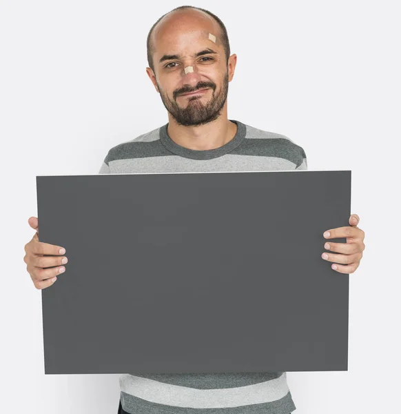 Homem segurando banner — Fotografia de Stock