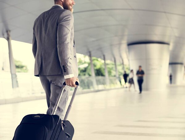 Businessmen Walking with travel Luggage 